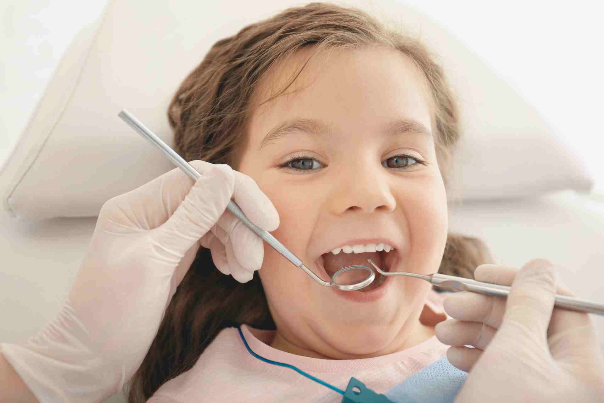 White Spots on Baby Teeth: What to Do and When to Call the Dentist